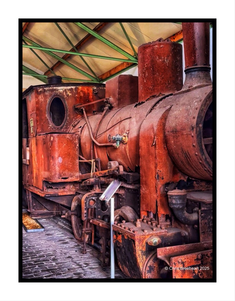 Rusty steam locomotive on display at the Steamtrain Museum in Katwijk, Leiden, showcasing vintage machinery and historical preservation.